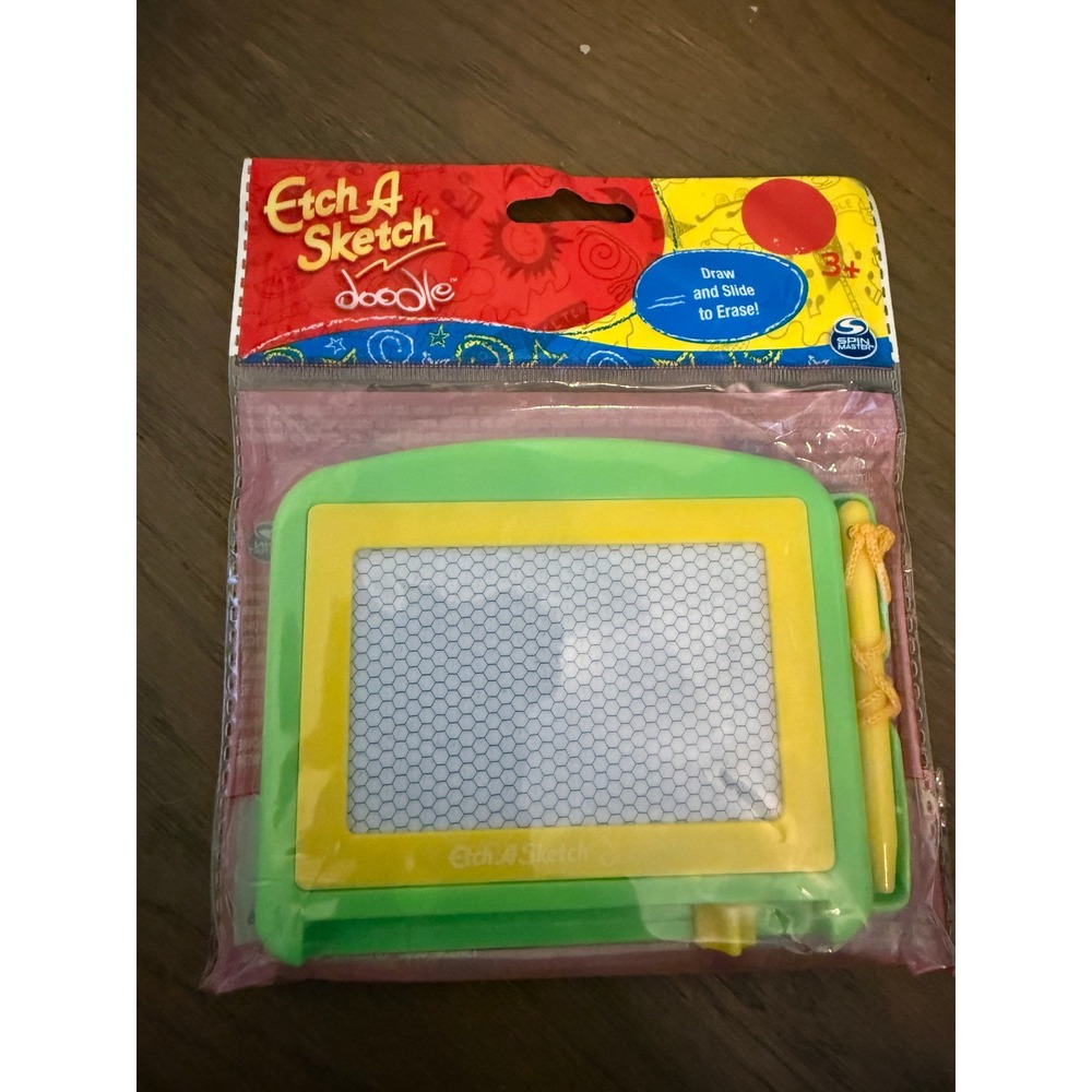 Etch A Sketch Doodle Magnetic Drawing Board Travel Toy Green Yellow Spin Master